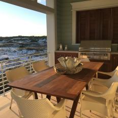 Coastal Outdoor Dining Room With Beach View