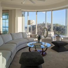 White Coastal Living Room With Curved Sofa