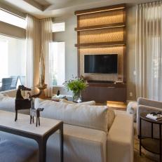 Neutral Contemporary Family Room With Sculptures