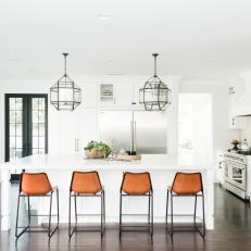 White Chef Kitchen With Brown Barstools