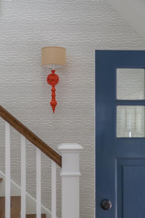 entryway with black-and-white wallpaper