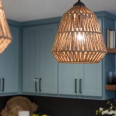 Contemporary Blue Kitchen with Neutral Pendant Lights 