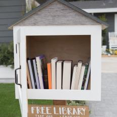 White Free Library in Contemporary Neutral Front Yard