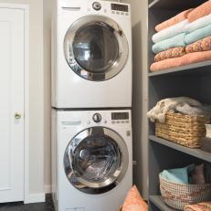 Contemporary Black and White Laundry Room with Black Shelves 