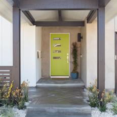 Neutral Southwestern Porch with Neon Front Green Door