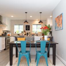 Contemporary Neutral Dining Area with Blue Chairs 