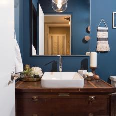 Contemporary Blue Bathroom with Brown Wooden Vanity