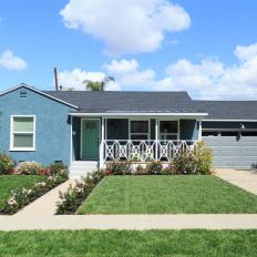 Contemporary Blue Home Exterior with Blue Garage 