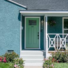 Contemporary Blue Home Exterior with Green Door