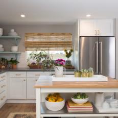 Contemporary White Kitchen with Gray Quartz Countertops and White Cabinets  