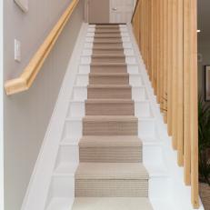 Contemporary White Stairs with Neutral Wooden Rails 