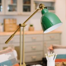 Contemporary Neutral Home Office with Green Lamp