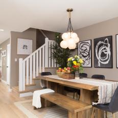 Contemporary Neutral Dining Room with Black and White Wall Art 