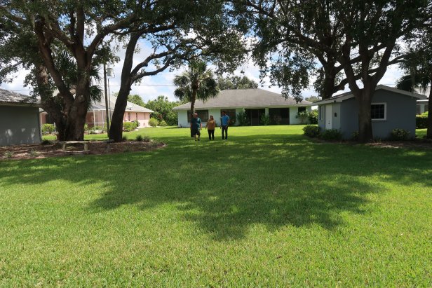 David Bromstad and winners walking around the backyardits huge!