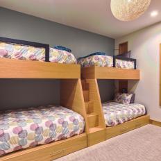Bunk Beds, Brightly-Colored Linens Create Cool Kids' Room