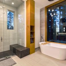 Modern Master Bathroom Boasts Glass Shower, Soaking Tub