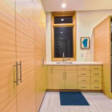 Modern Laundry Room With Stackable Washer & Dryer