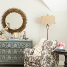 Transitional Bedroom With Floral Chair, Wood Side Table