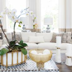 Coffee Table With Gold Decor Elevates Eclectic Living Room