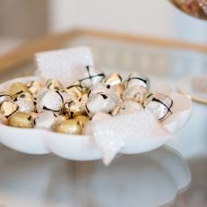 Holiday Decorating Detail With Gold And Silver Jingle Bells