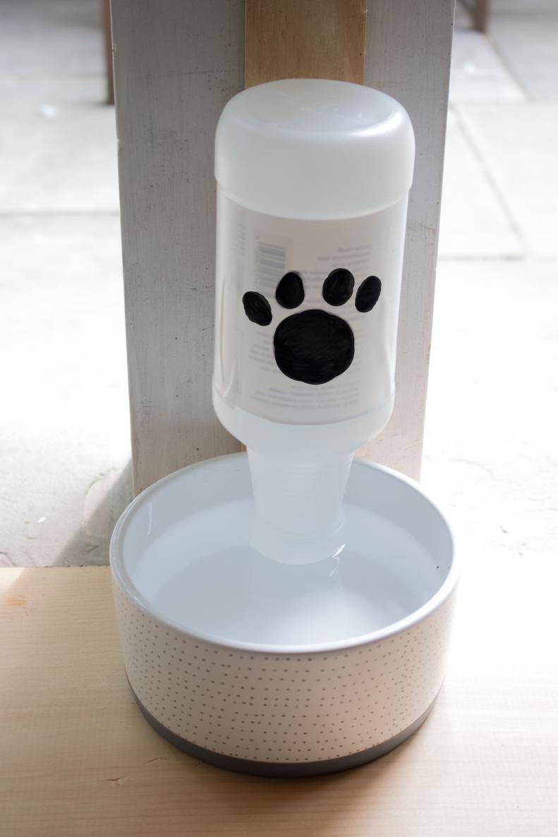 Keep your pet's water fresh with a DIY refillable water bowl.