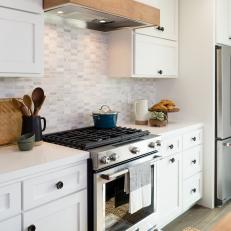 Contemporary White Kitchen with Gray Tile Backsplash
