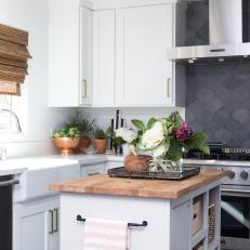 Contemporary White Kitchen with Black Tile Backsplash 