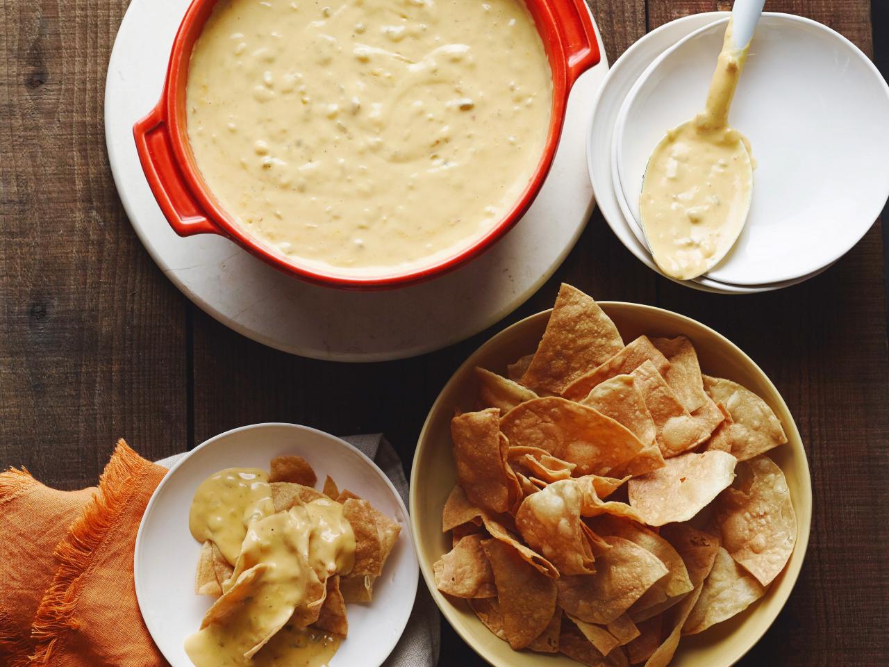 https://hgtvhome.sndimg.com/content/dam/images/hgtv/fullset/2018/8/31/1/RX_FN-WU0813_Green-Chile-Queso.jpg.rend.hgtvcom.1280.960.suffix/1535740435763.jpeg