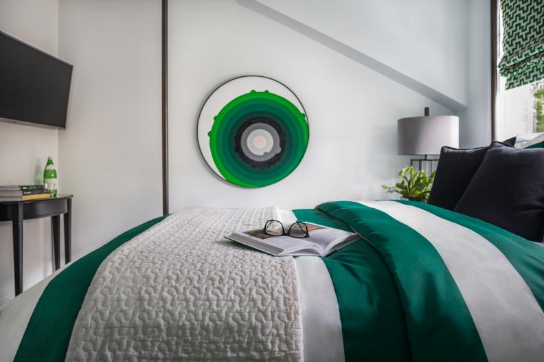 Guest Bedroom With Green Art
