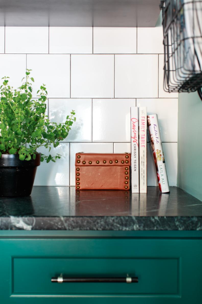 White Kitchen Backsplash and Green Cabinet