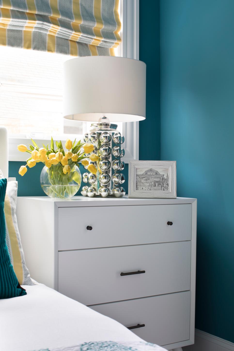 White Nightstand in Blue Bedroom HGTV