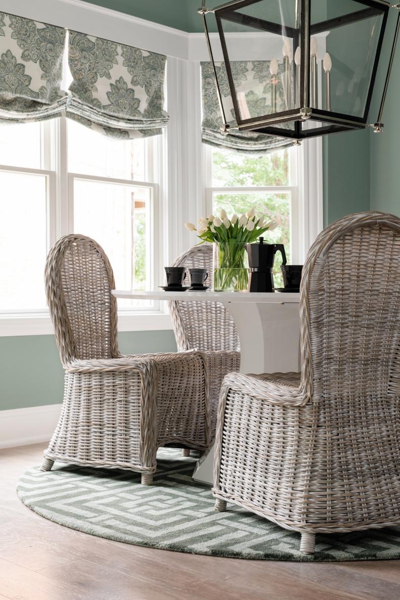Blue Dining Room With Rattan Chairs