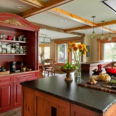 Rustic Open Plan Kitchen With Red Pantry