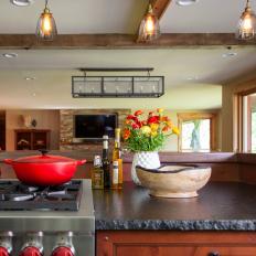 Rustic Kitchen With Red Cooking Pot