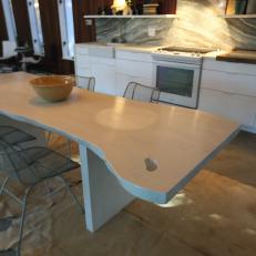 Modern Neutral Kitchen with White Slab Table 