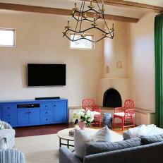 Southwestern Living Room With Blue Cabinet