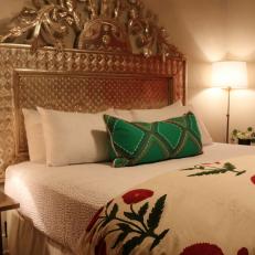 Southwestern Bedroom With Green Pillow