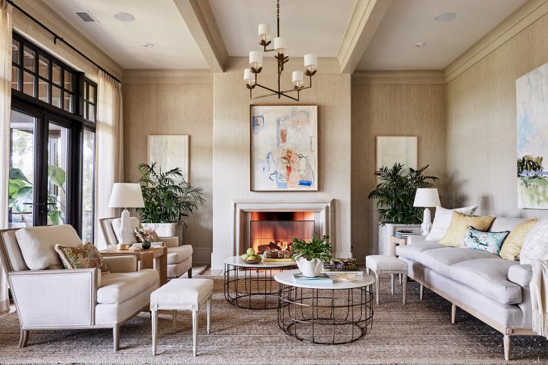 Luxury Coastal Living Room with Grasscloth Walls and a Fireplace