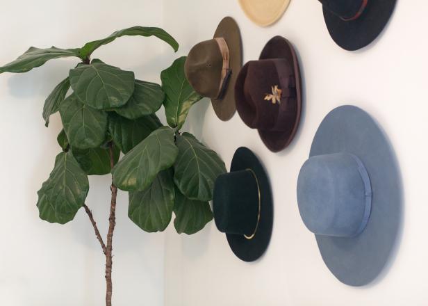 Make a favorite fashion accessory into decor, as seen in this clever way of storing hats in Pap Shirock's Los Angeles home. "Hanging them on the wall was just a way to try to keep them from being crushed, but I do like the way it looks."