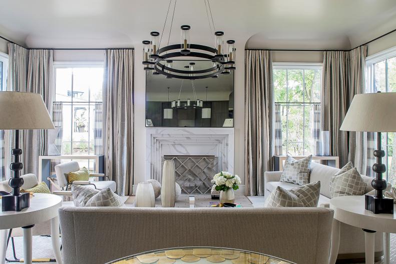 Transitional Luxury Living Room with Sleek Fireplace, Draperies, Chandelier