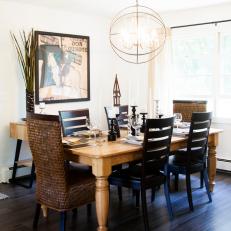 Neutral Dining Room With Globe Chandelier
