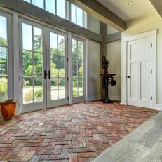 Country Foyer With Brick Floor
