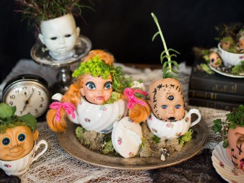 Creep Out Your Neighborhood With Baby Doll Head Planters!