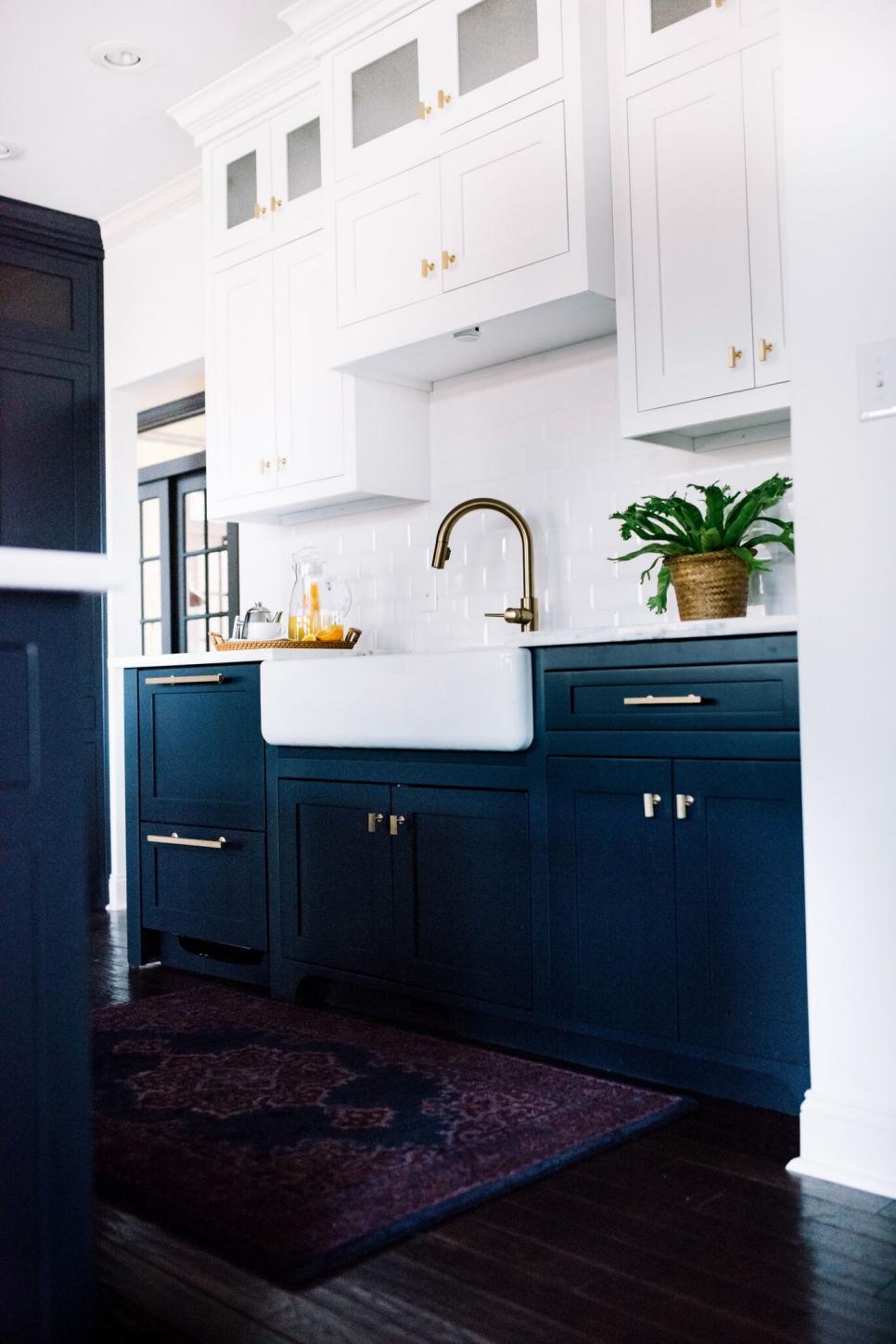 Contemporary Kitchen With Navy Blue Base Cabinets And White Upper