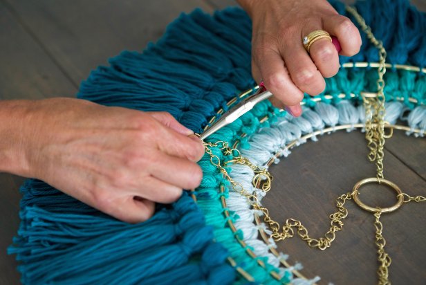 Talent Attaching Smallest Ring To Medium Ring With Chain And Close Up With Pliers