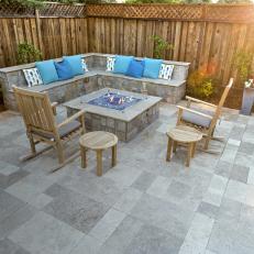 Custom Stone Fire Pit Sitting Area With Stone Bench Seating