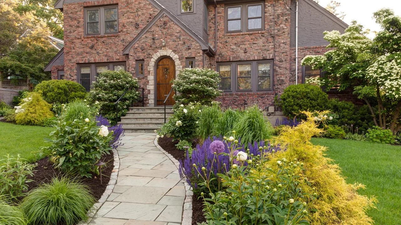 Tudor Home Features Front Yard With Perennials | HGTV, image size:1280x720