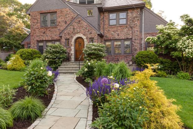 Tudor Home Features Front Yard With Perennials Hgtv S Ultimate Outdoor Awards Hgtv