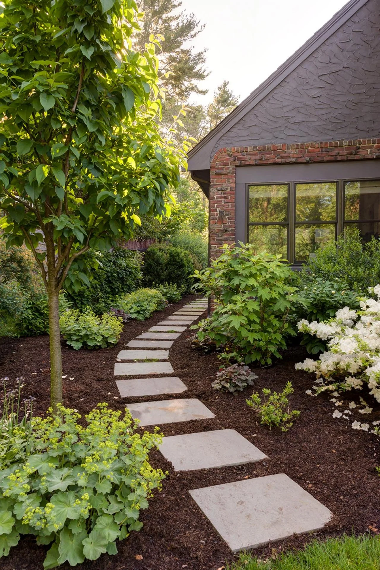 Tudor Home Features Front Yard With Perennials | HGTV, image size:1280x1920