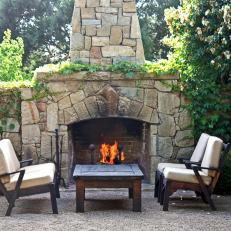 Outdoor Stone Fireplace With Vines